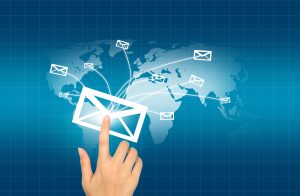 hand pressing envelope that is sent world