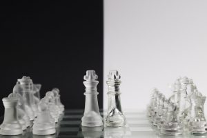 transparent chess pieces board