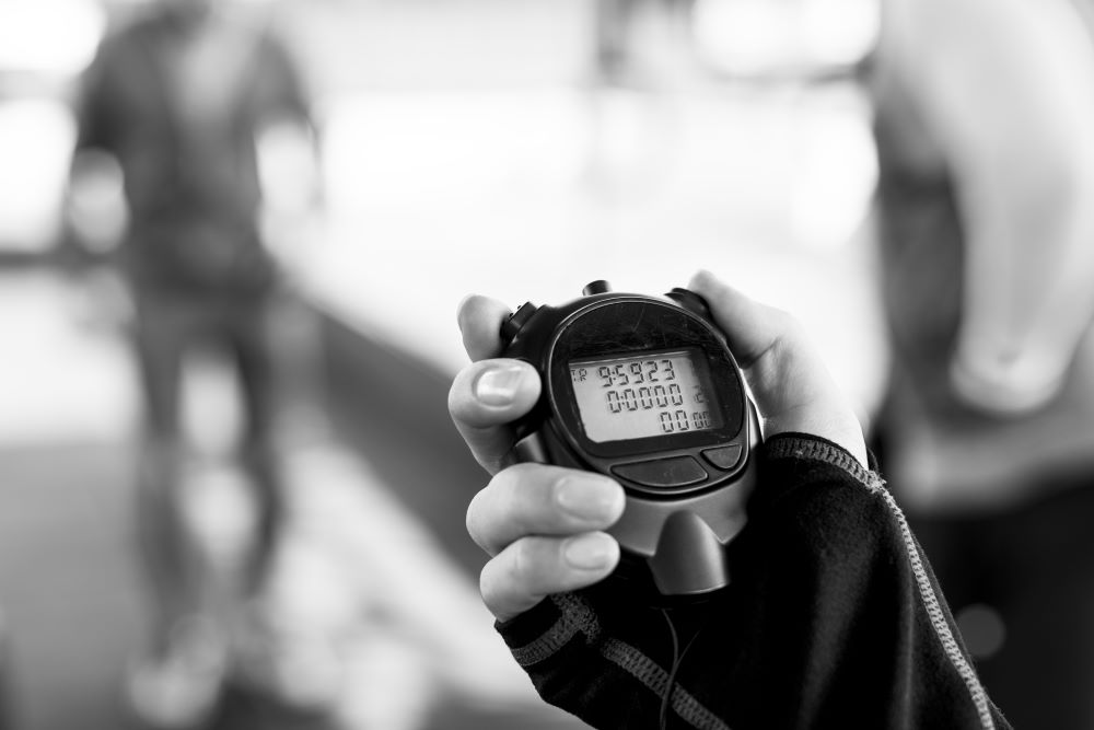 closeup hand holding stopwatch 2